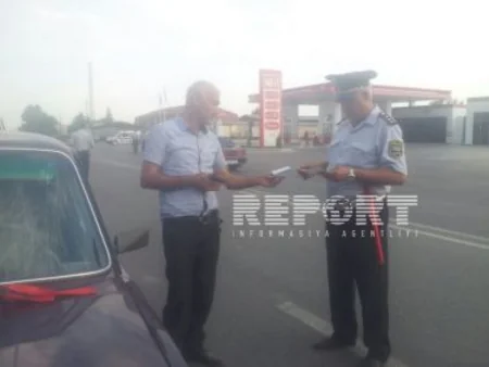 Avtomobilinə şüar yazan sürücü cərimələnib - FOTO