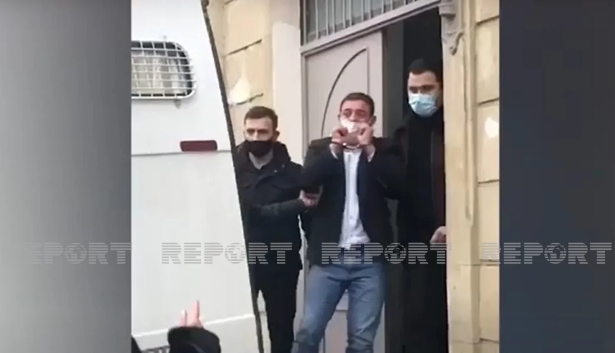 Распространены кадры Аты Абдуллаева в наручниках