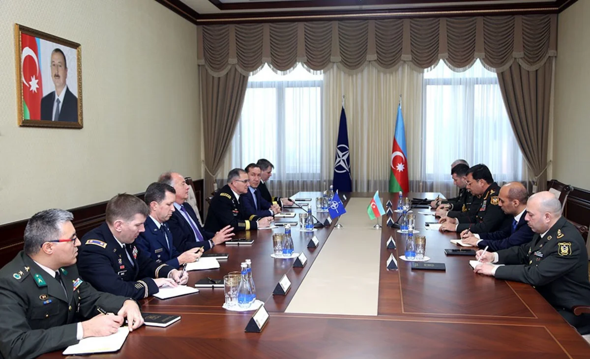 Colonel General Najmeddin Sadikov meets with Supreme Allied Commander Europe