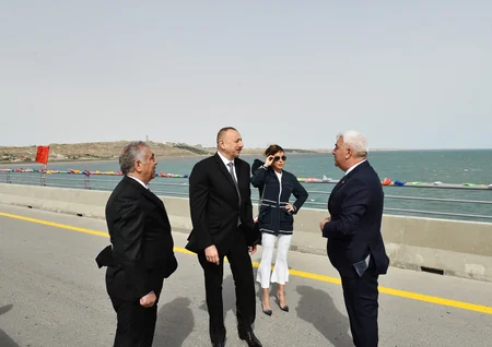 President Ilham Aliyev inaugurates a new bridge in Pirallahi settlement