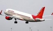 Air India təyyarəsi enişdən sonra alovlanıb