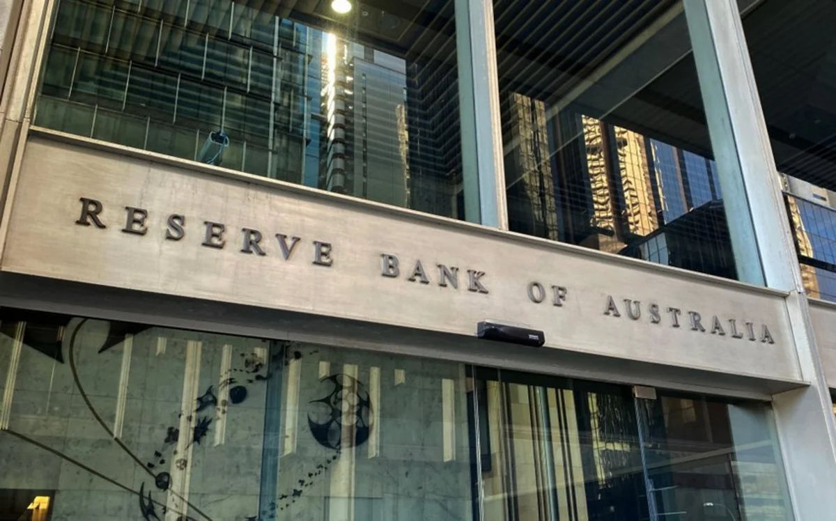 Australia's central bank raises rates to 12-year high, tempers hawkish stance