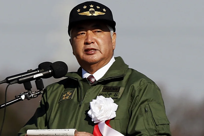 Japan’s defense minister says North Korea launched 7 missiles that flew 400 km each