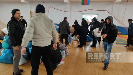 Qaxda yığılan yardımla dolu ilk TIR Türkiyəyə yola düşüb