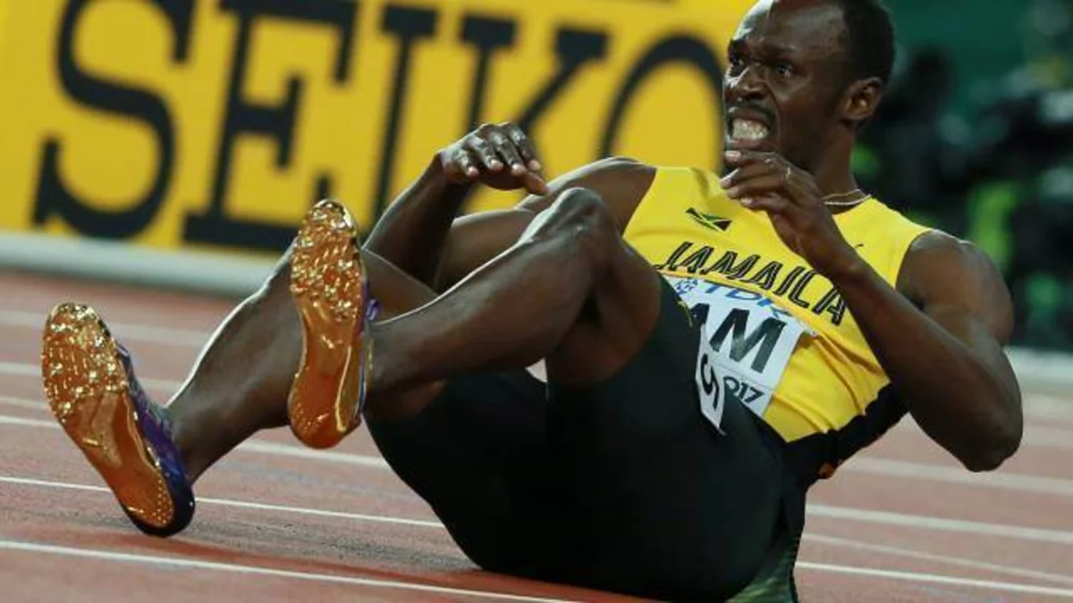 Useyn Bolt futbol karyerasını başa vurub