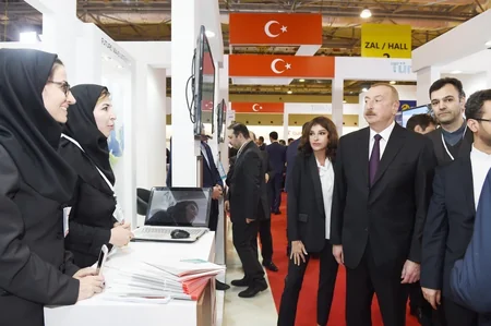 President Ilham Aliyev views Bakutel 2018 exhibition