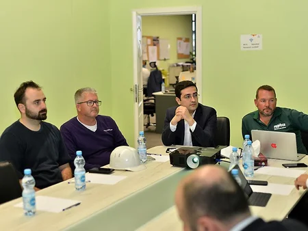 UEFA representatives view grass cover at Baku Olympic Stadium