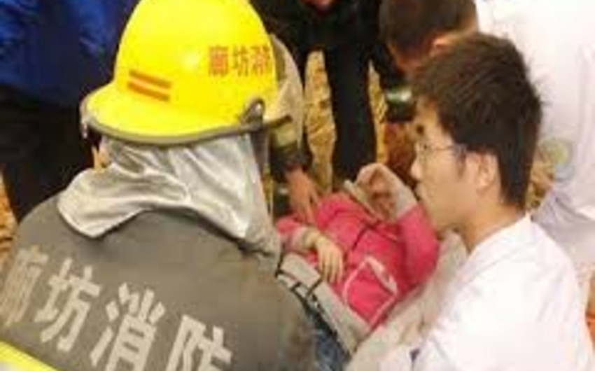 In China, a large number of workers remain under rubble of collapsed factory