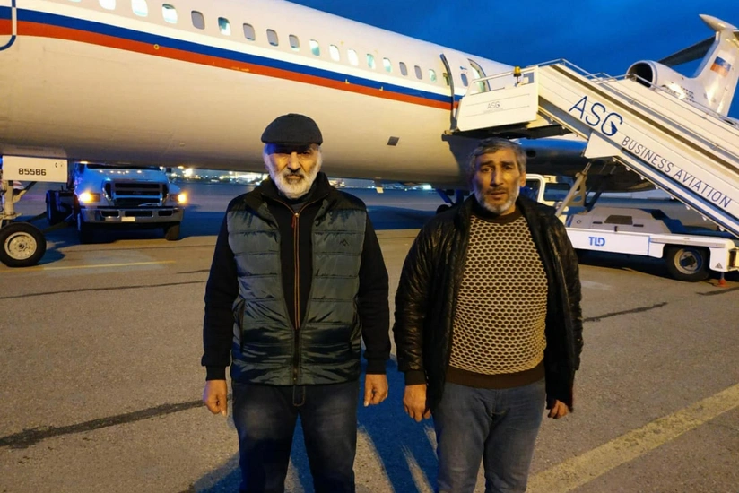 Azerbaijani hostages Dilgam Asgarov, Shahbaz Guliyev arrive in Baku