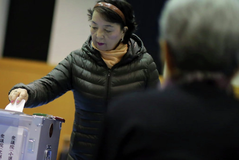 Japan snap elections: Voters choose new parliament amid recession