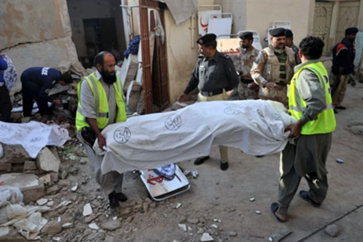 Death toll in suicide bombings that killed Pakistani official rises to 20