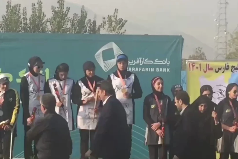 Iranian national team athlete removes her headscarf in front of sports officials