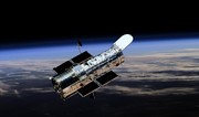 Телескоп Хаббл запечатлел кольцо Эйнштейна, состоящее из трех галактик
