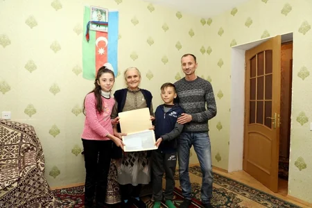 Kürdəmir və Ağsuda şəhid ailələri və müharibə əlillərinə mənzillər verilib