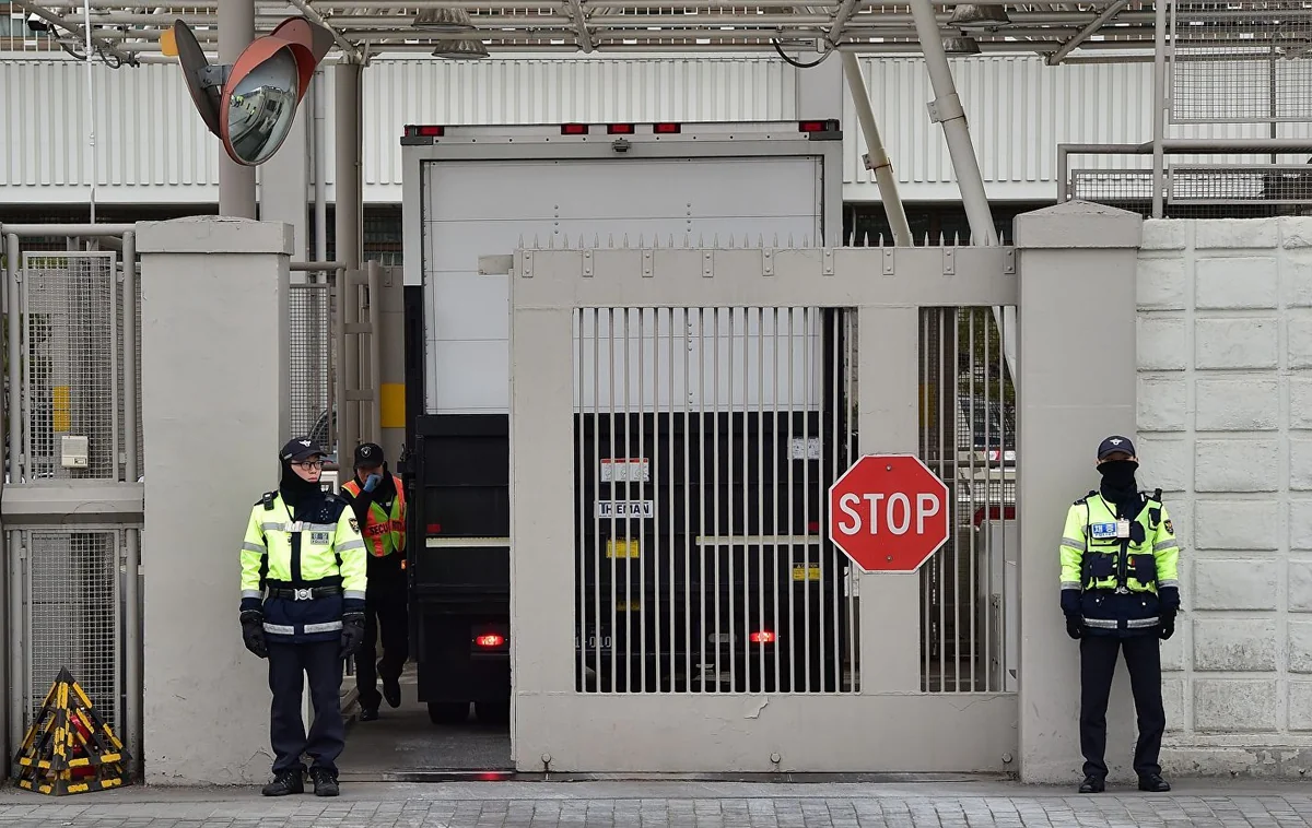 Car loaded with gas canisters rams into gates of US Embassy in Seoul