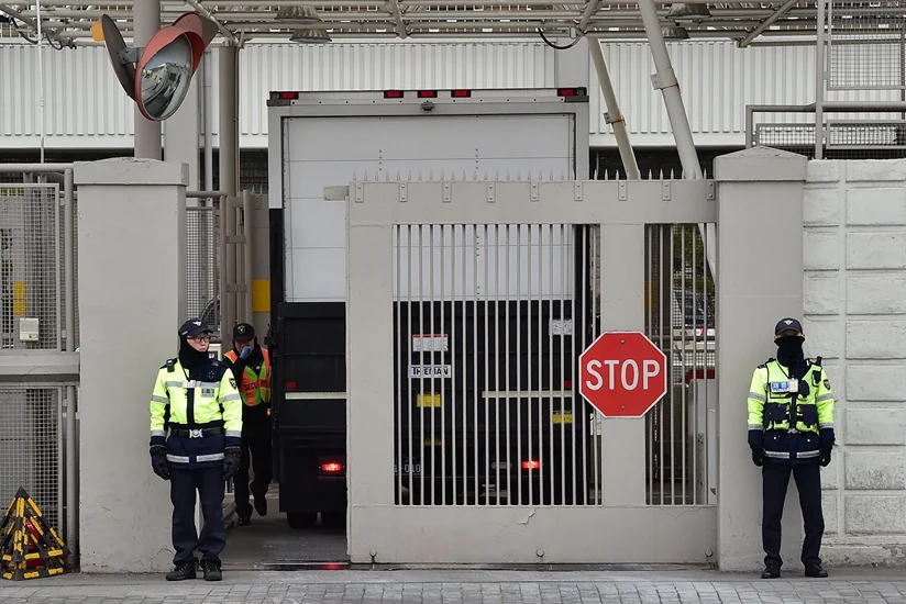 Car loaded with gas canisters rams into gates of US Embassy in Seoul