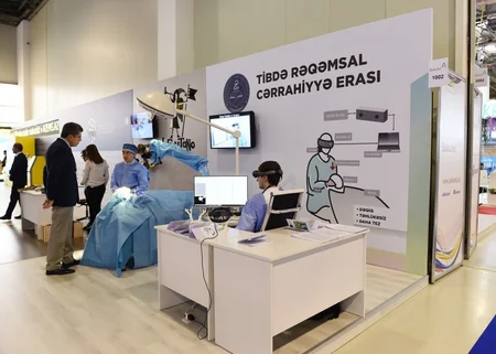 President Ilham Aliyev views Bakutel 2018 exhibition