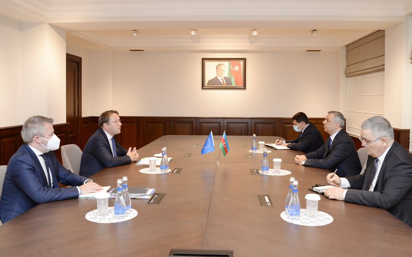 EU Commissioner meets with Samir Nuriyev and Hikmet Hajiyev