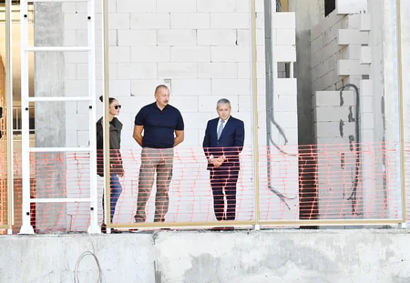 Ilham Aliyev and Mehriban Aliyeva view progress of construction works at Shusha hotel and conference center