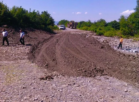 Şəkidə sel suları nəticəsində sıradan çıxan yol bərpa olunub - FOTO