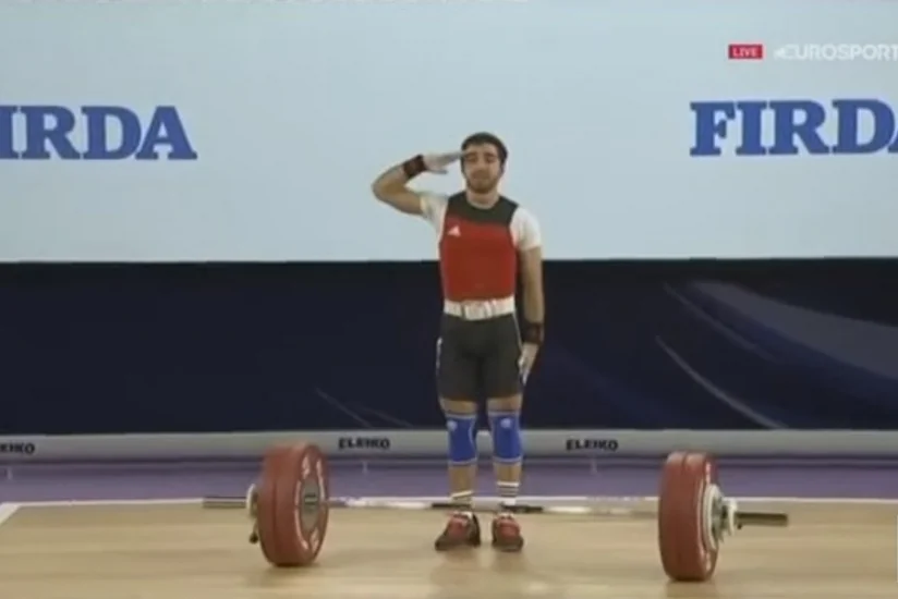 Azerbaijani weightlifter salutes at Norway European Championship