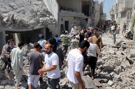 ​Suriyada bir məhəlləyə hücumda 15 nəfər ölüb, onlarla insan yaralanıb - FOTO