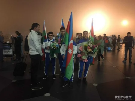 Olimpiadada iştirak etmiş Azərbaycan idmançıları Bakıya qayıdıblar - FOTO