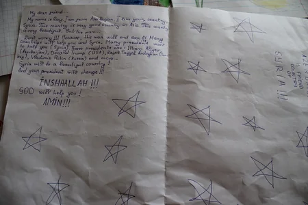 Azerbaijani students sent gifts and letters to Syrian peers