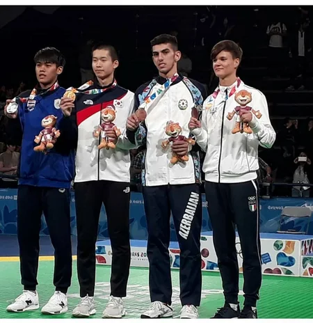 Azerbaijani taekwondo wrestler wins bronze award in junior Olympics - PHOTO