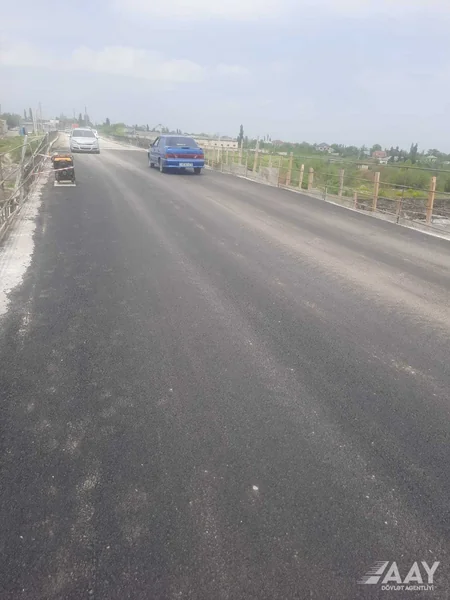 Qubada sel sularının qəzalı vəziyyətə saldığı körpü bərpa olunub