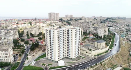 İlham Əliyev və Mehriban Əliyeva Bakıda şəhid ailələrinə, müharibə əlillərinə mənzil və avtomobillərin təqdimatında iştirak ediblər