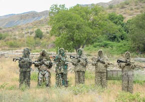In safe hands: Azerbaijani soldiers guard the heights of Lachin