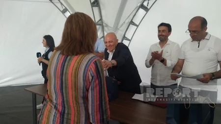 Families returning to Lachin receive keys to their homes