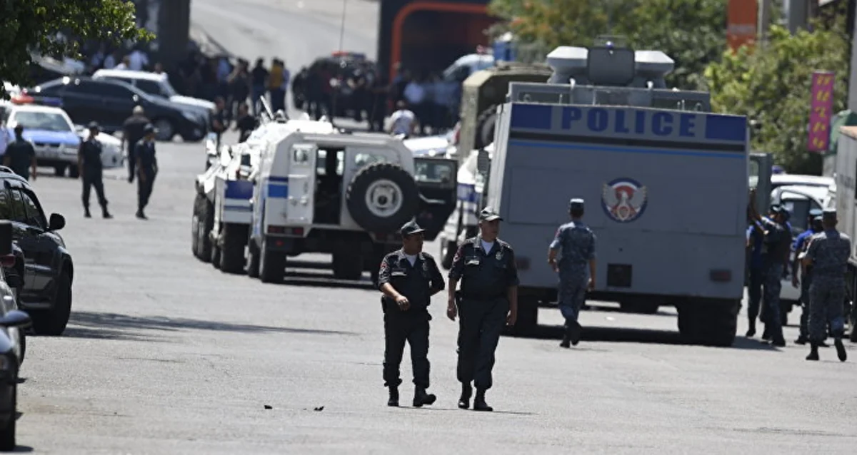 Armed men seized police station in Yerevan released two more hostages