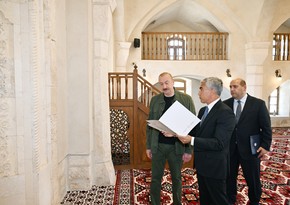 İlham Əliyev Ağdamın Qiyaslı kəndindəki tarixi məscidin binasının bərpadan sonra açılışında iştirak edib