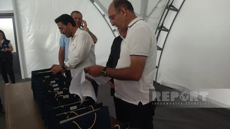 Families returning to Lachin receive keys to their homes