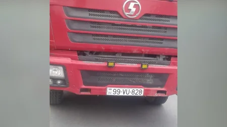 Yük avtomobilində qohumunu gizlədən sürücü saxlanıldı