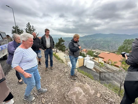 Swedish travelers view restoration work in Lachin