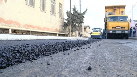 Deformasiyaya uğramış Sabunçu-Ramana avtomobil yolu  asfaltlanır - VİDEO