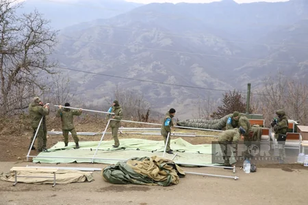 Russian peacekeepers dismantle their tents set up in protest area, take away containers - VIDEO