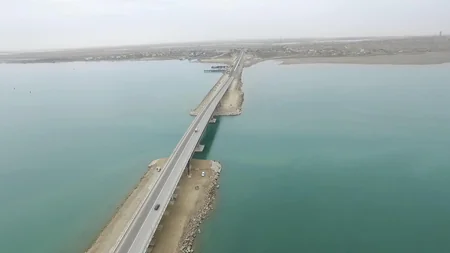 President Ilham Aliyev inaugurates a new bridge in Pirallahi settlement