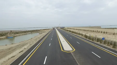 President Ilham Aliyev inaugurates a new bridge in Pirallahi settlement