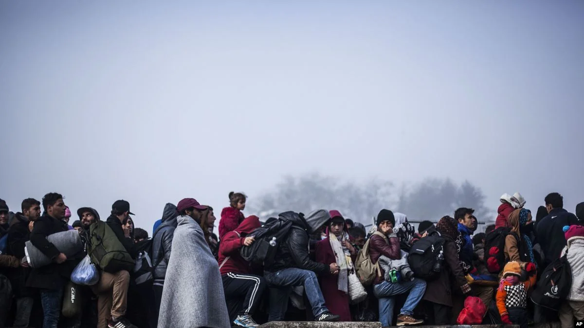 How will the mass influx of migrants affect Azerbaijan's economy?