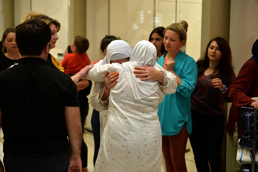 Azərbaycanlı zəvvarlar Bakıya qayıdıb - FOTOREPORTAJ