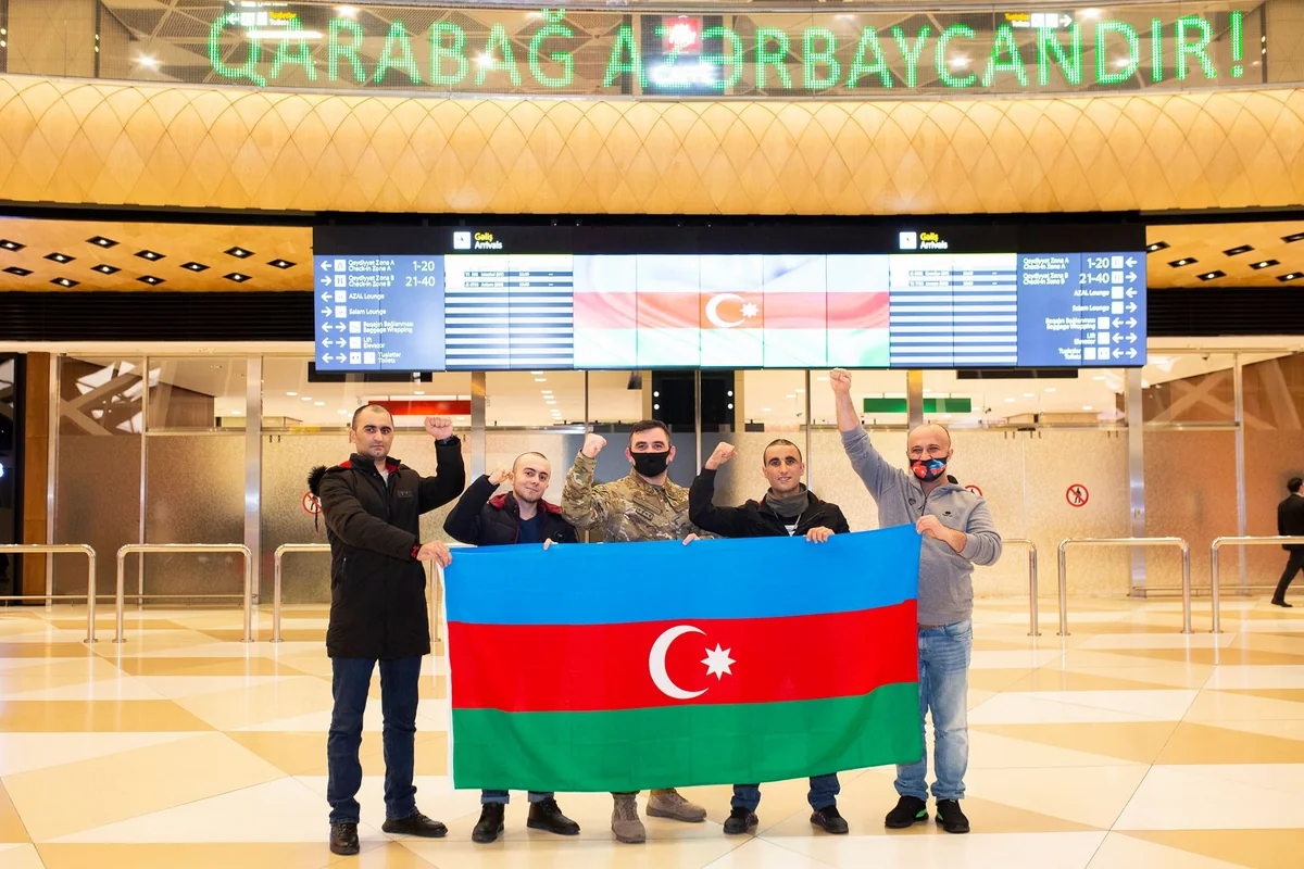 Four veterans sent by YASHAT to Turkey return to Azerbaijan