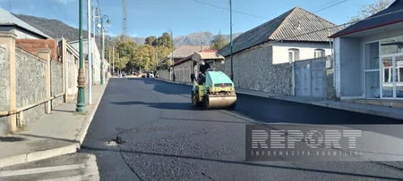 Oğuzun 14 küçəsində yollar təmir olunur