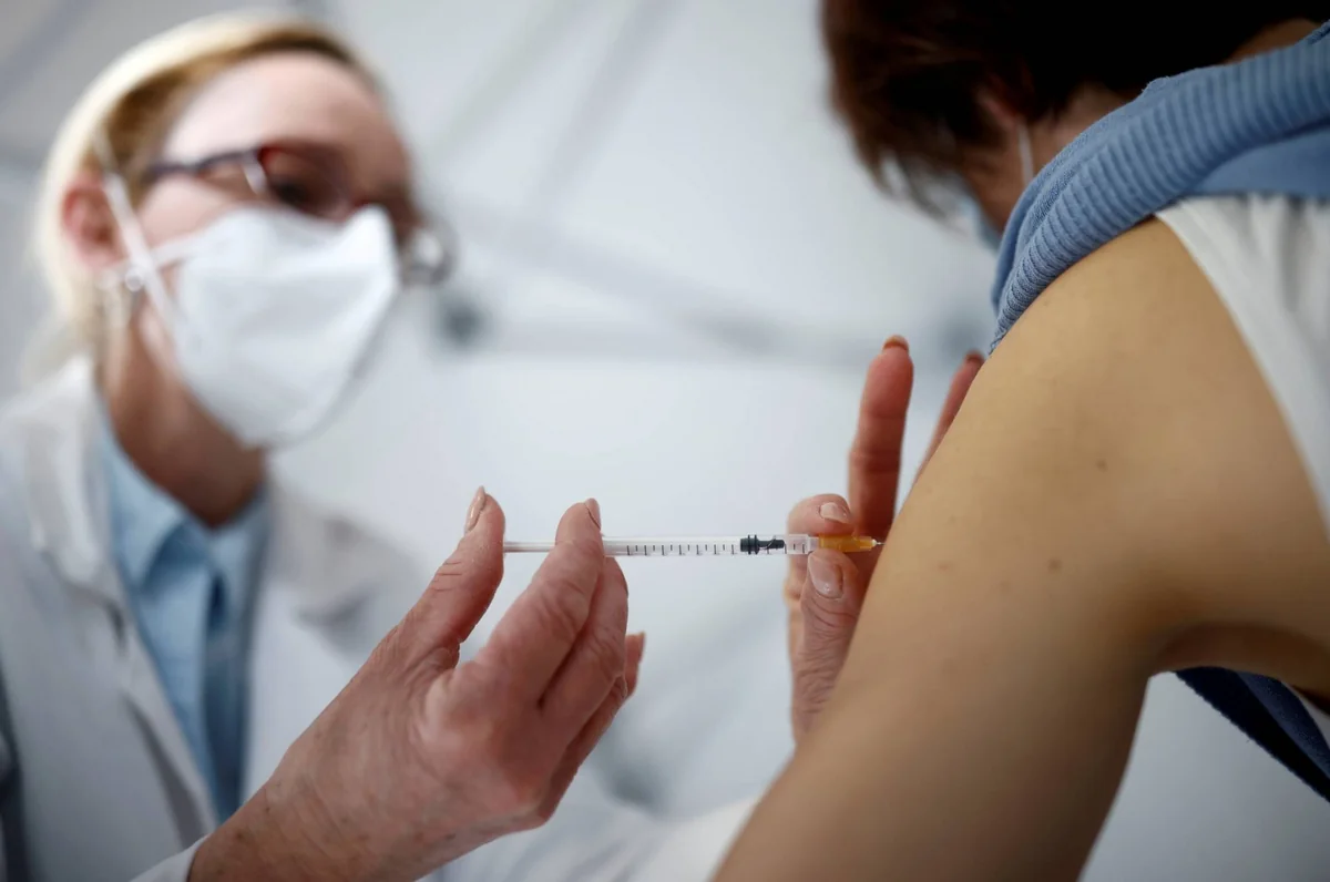 First vaccine dose halves risk of contracting COVID