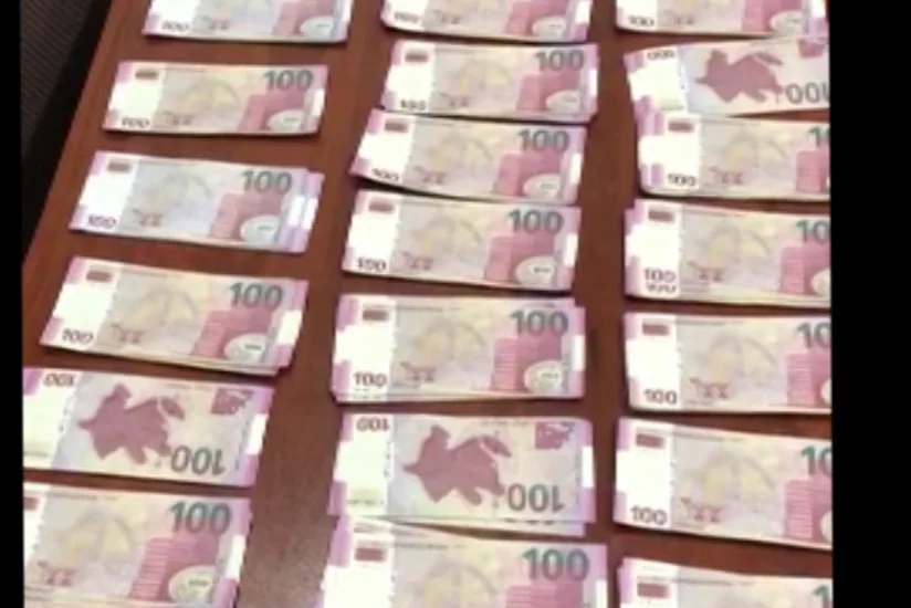 Abşeronda 20 min saxta manatı 4100 dollara satmaq istəyən şəxs tutulub