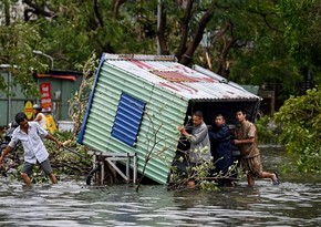 Vietnam floods leave at least 14 dead or missing