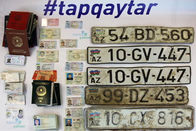 Tullantıların içərisindən tapılan sənədlər və avtomobil nömrələri polisə təhvil verilib